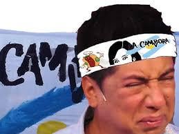 La Cámpora Supporter Cries Into the Flag