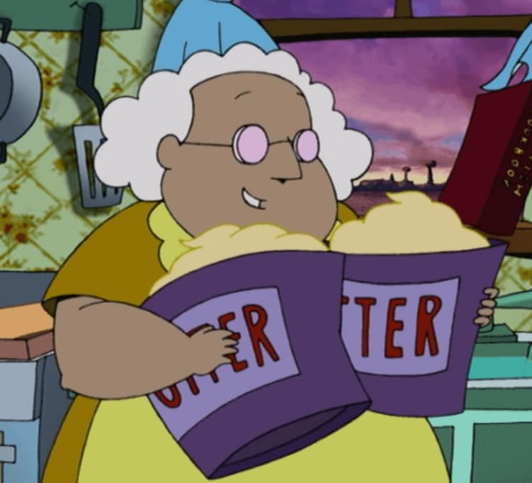 Muriel Proudly Holds Two Tubs of Butter