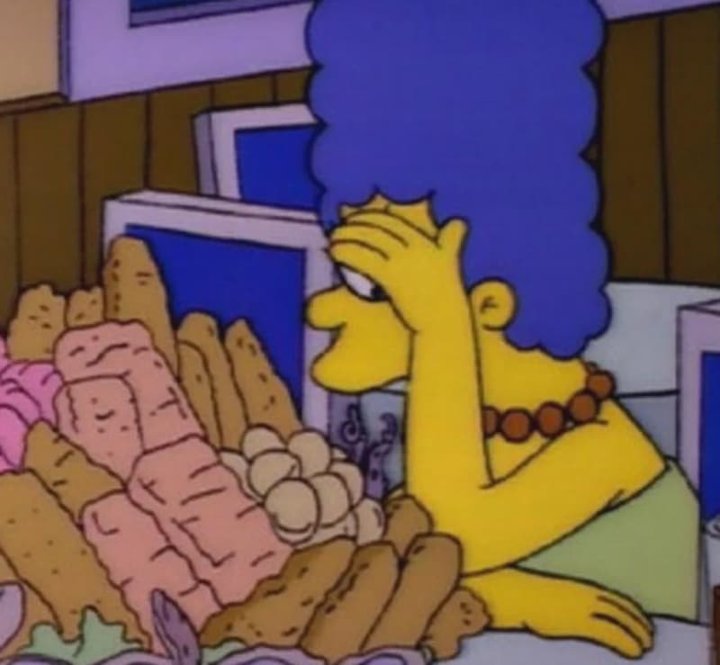 Marge Facepalms In Front Of A Food Mountain — Simpsons meme