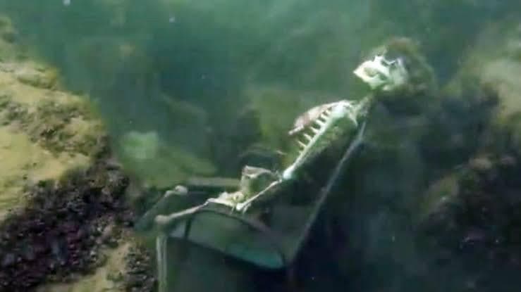Skeleton Still Waiting Underwater in Lawn Chair — Waiting Skeleton meme